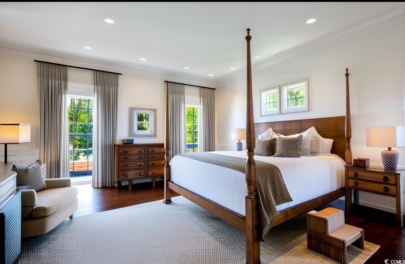 12 Chapin Circle Myrtle Beach, SC 29572 - Photo 9 of 39 Bedroom with dark wood finished floors, ornamental molding, and recessed lighting