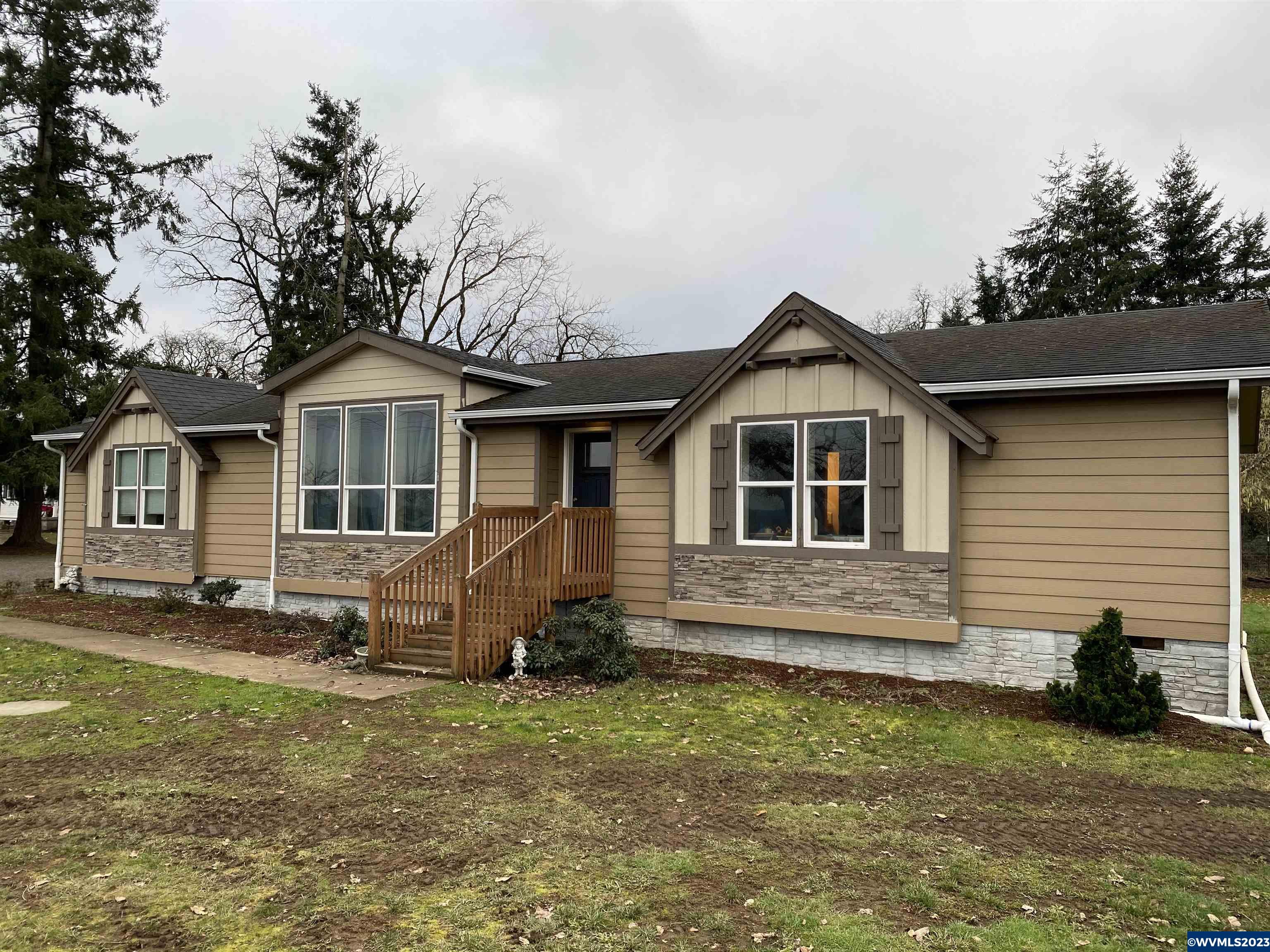 6120 Little Road Southeast Turner, OR 97392 - Photo 21 of 21 a front view of a house with garden