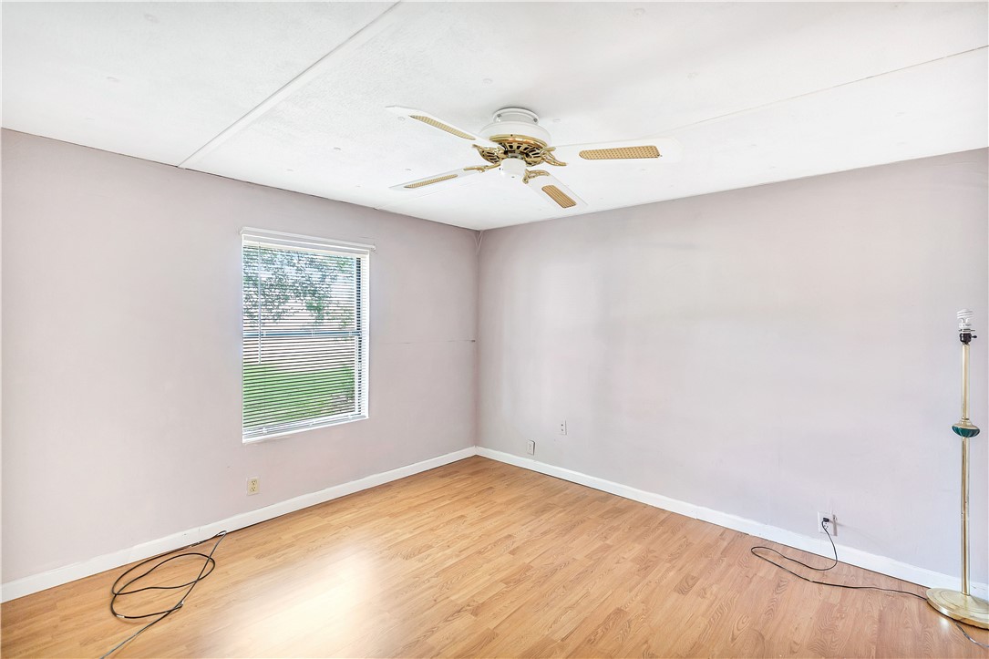 1004 Wiles Road Anderson, SC 29625 - Photo 15 of 26 Well-lit interior featuring a ceiling fan and ample natural light through a generous window.