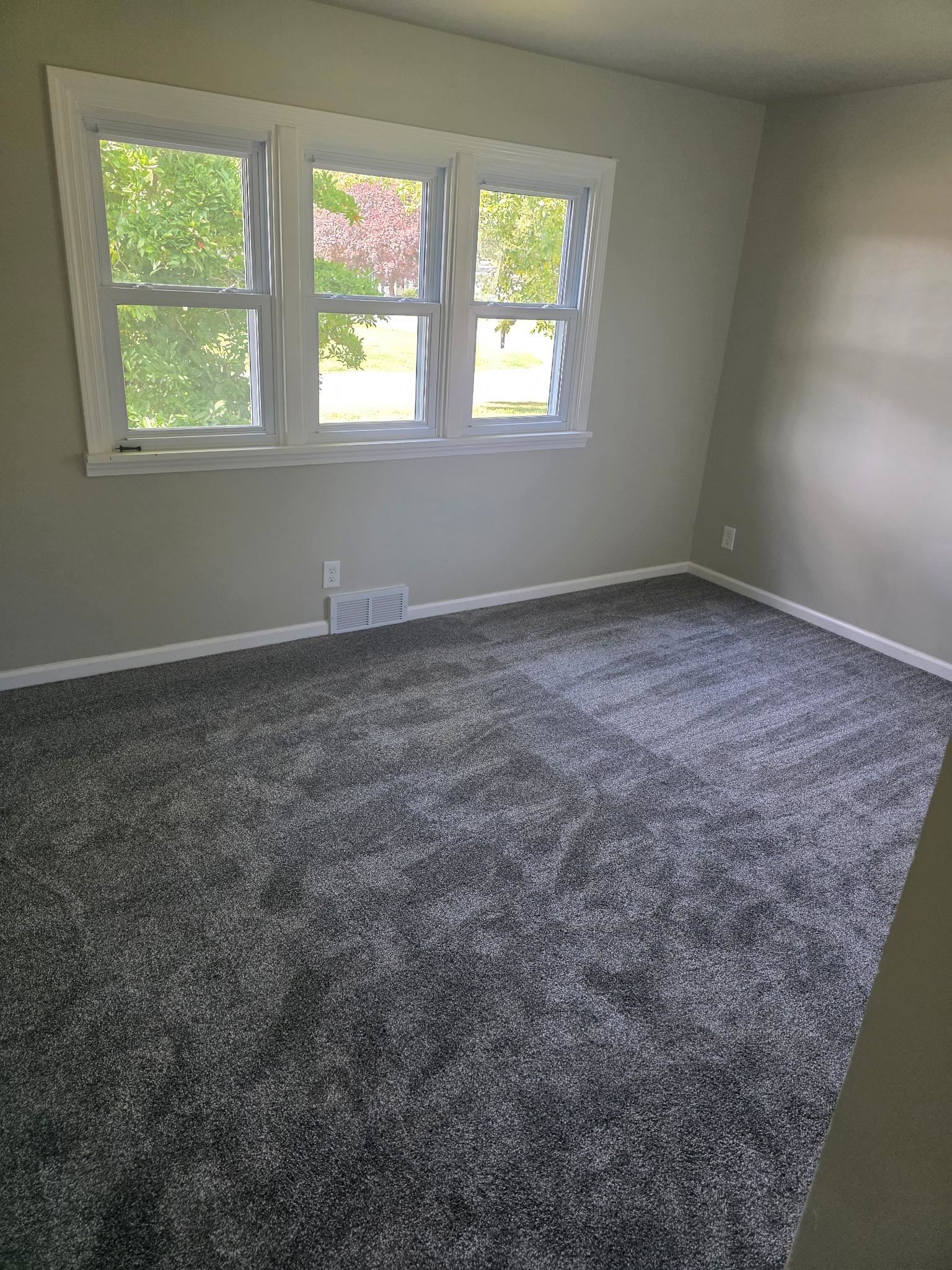 704 Spruce Street Savanna, IL 61074 - Photo 13 of 19 an empty room with windows