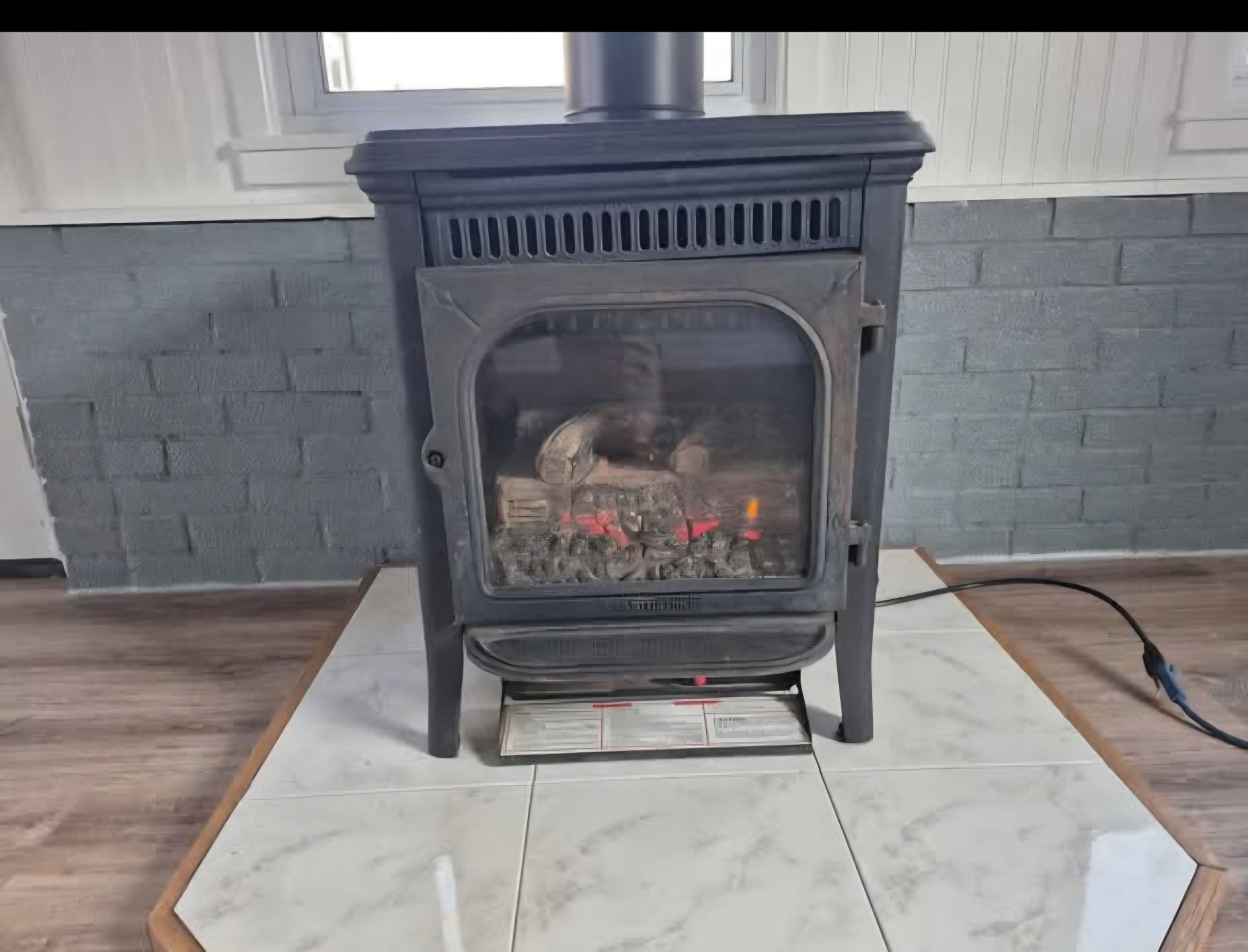 704 Spruce Street Savanna, IL 61074 - Photo 16 of 19 a living room with a fireplace