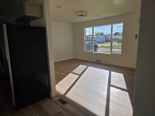 a view of an empty room and window