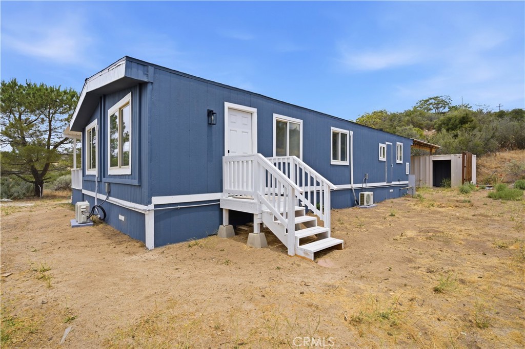 59995 Granite Gulley Road Anza, CA 92539 - Photo 3 of 33 front view of a house with a yard