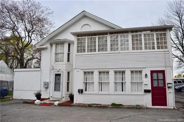 a front view of a house with a garage