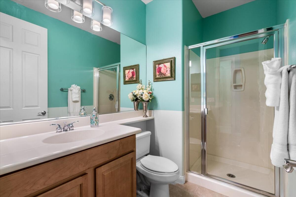 81836 Bowstring Circle La Quinta, CA 92253 - Photo 20 of 55 a bathroom with a sink toilet and shower