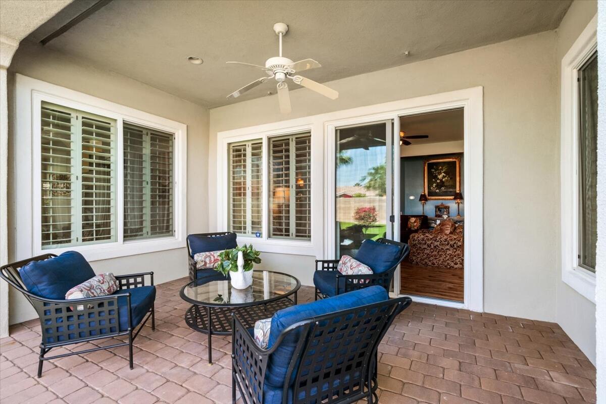 81836 Bowstring Circle La Quinta, CA 92253 - Photo 33 of 56 a living room with furniture and windows