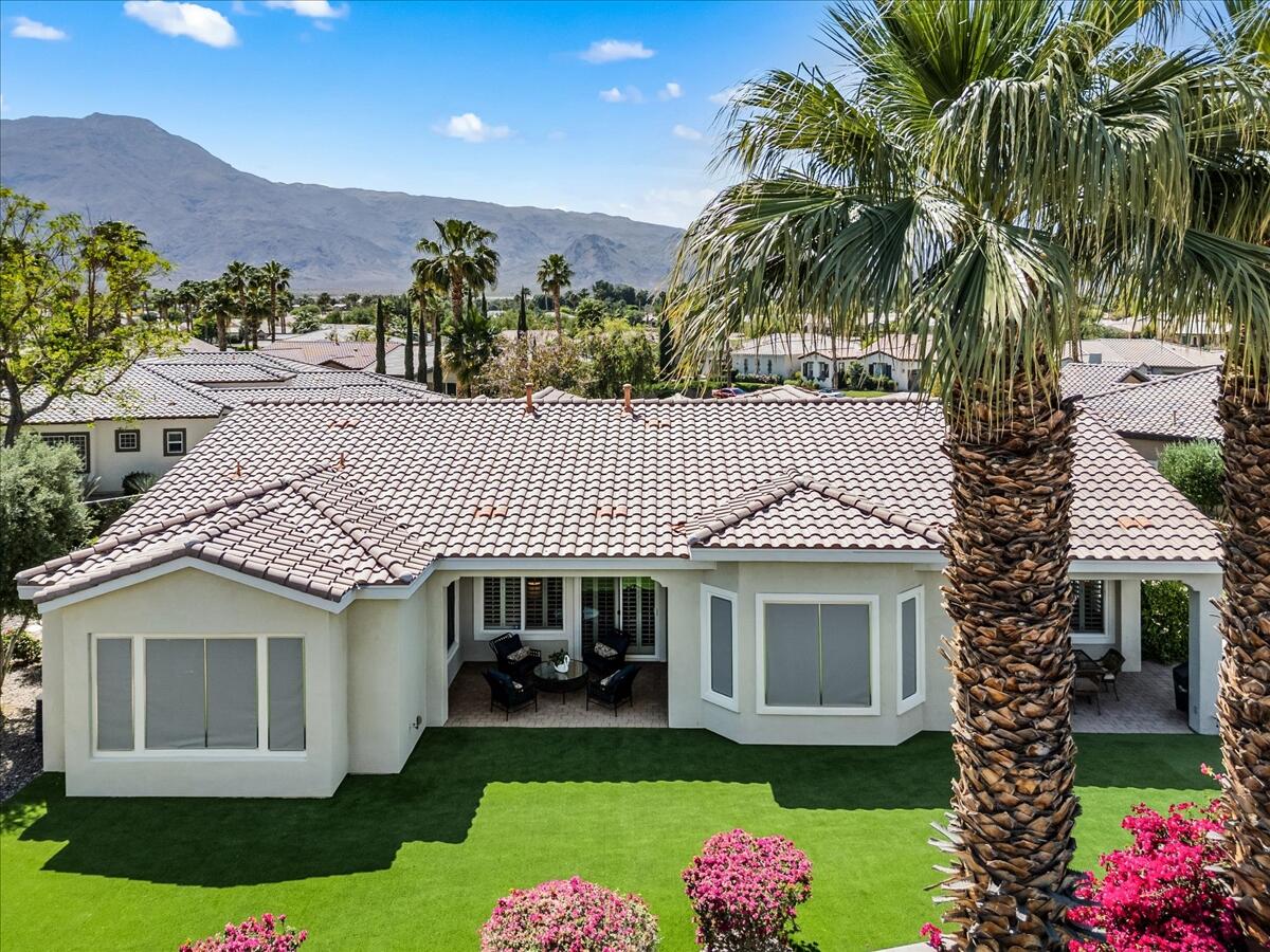 81836 Bowstring Circle La Quinta, CA 92253 - Photo 42 of 56 a front view of a house with a yard