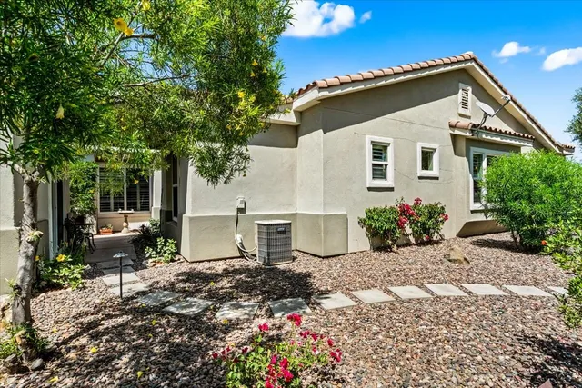 a house view with a garden space