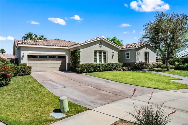 a front view of a house having yard