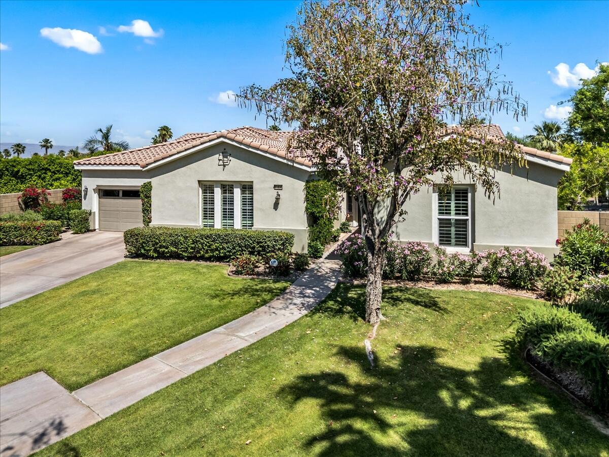 81836 Bowstring Circle La Quinta, CA 92253 - Photo 50 of 56 a house view with a garden space
