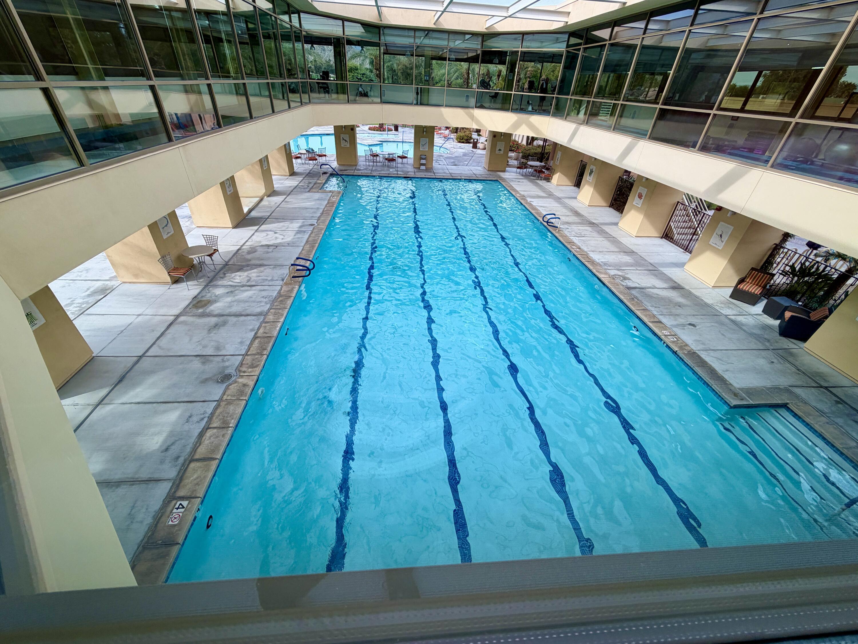 81836 Bowstring Circle La Quinta, CA 92253 - Photo 51 of 55 a view of deck with wooden floor and seating
