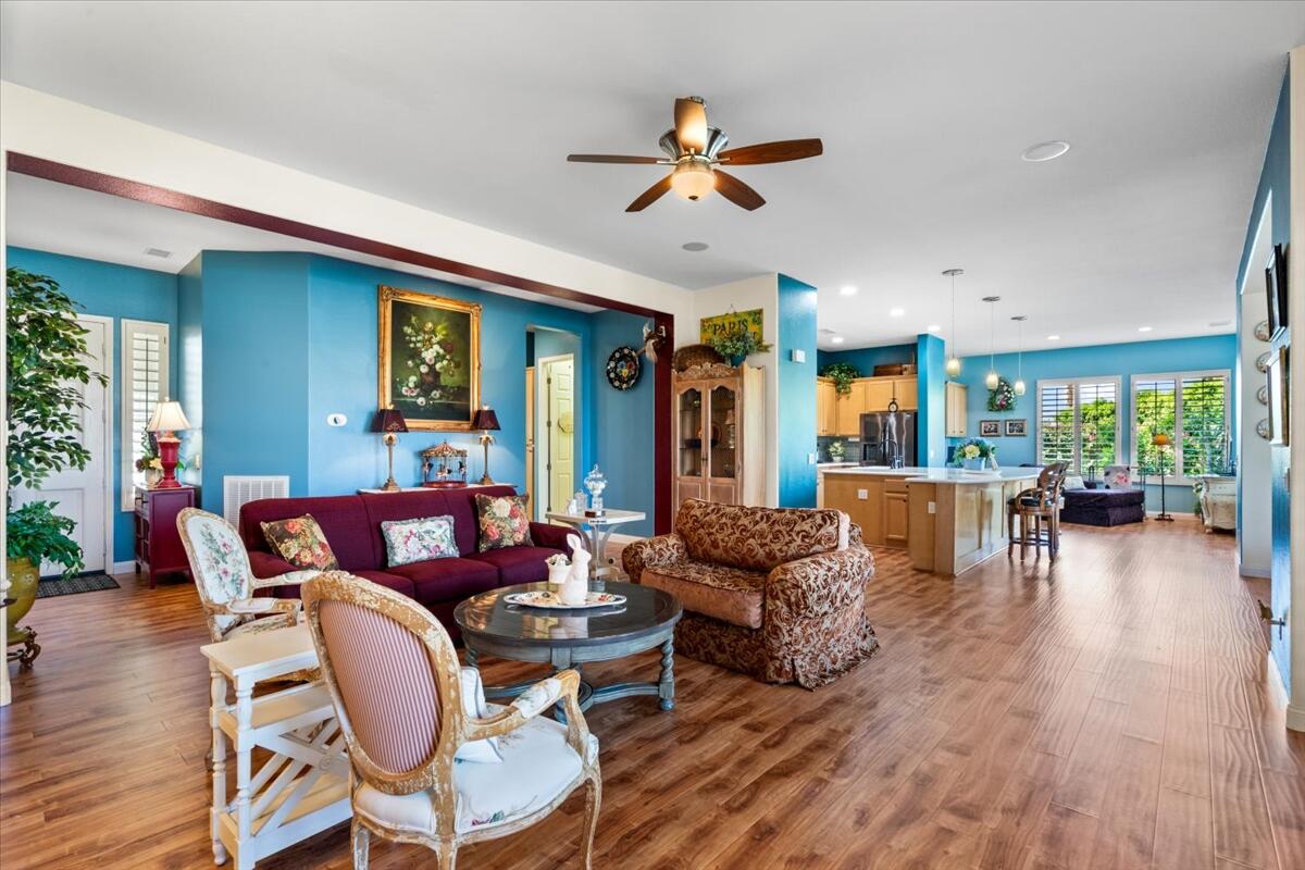 81836 Bowstring Circle La Quinta, CA 92253 - Photo 9 of 56 a living room with furniture and a large window