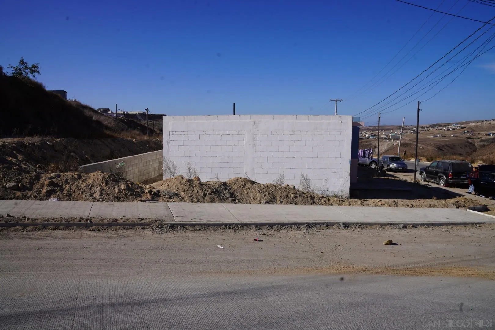 23 Blvd. Prieto Azabache Tijuana, B.C. 99999 - Photo 19 of 34 a view of a road with a building in the background