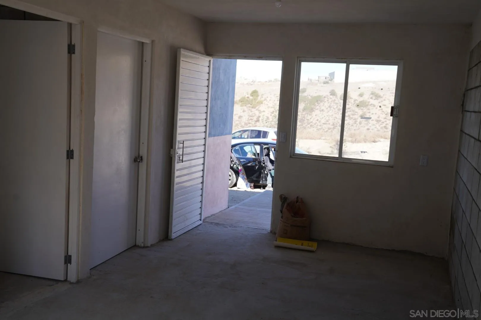 23 Blvd. Prieto Azabache Tijuana, B.C. 99999 - Photo 10 of 34 a view of livingroom with furniture and a window