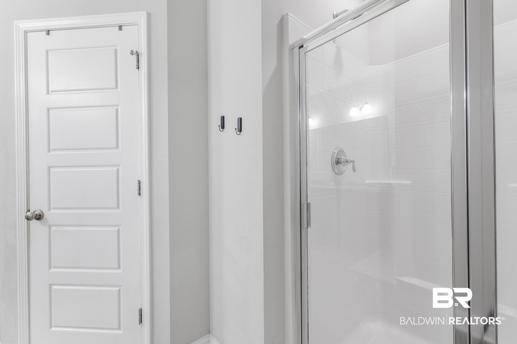 31336 Hoot Owl Road Daphne, AL 36527 - Photo 14 of 36 Bathroom featuring a shower stall and baseboards