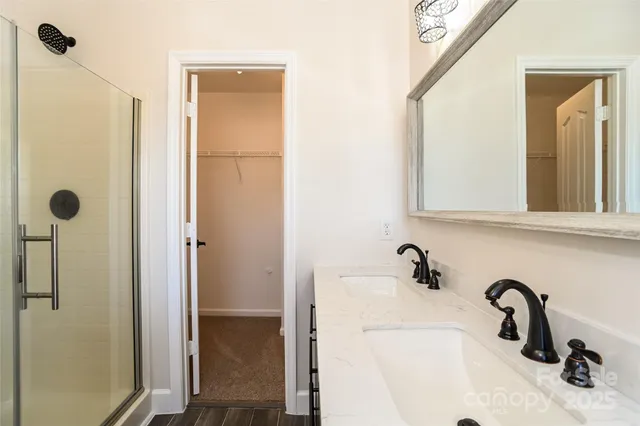 a bathroom with a sink and mirror
