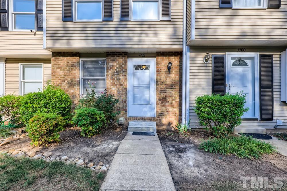 7702 Ohmann Court Raleigh, NC 27615 - Photo 3 of 28 a view of a pathway door of house