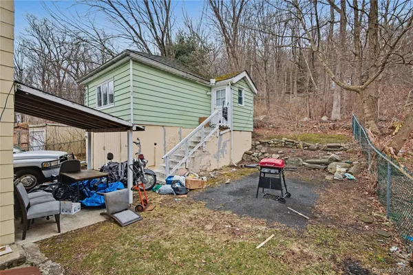 a view of house with patio