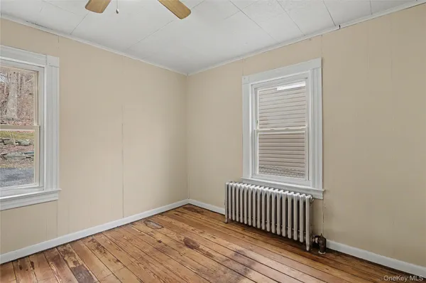an empty room with windows