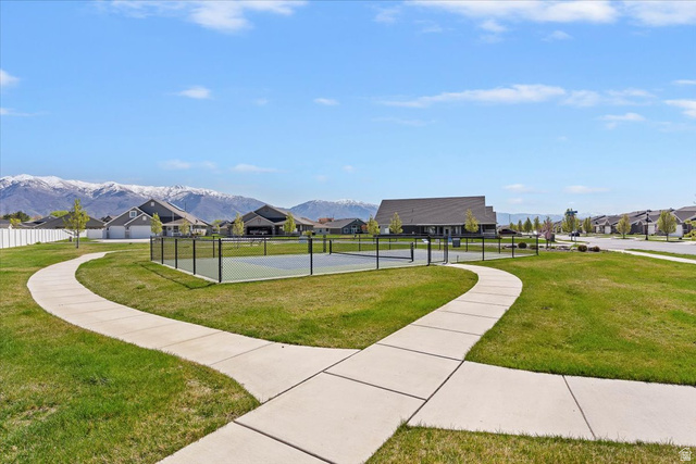 2028 West Grace Way Layton, UT 84041 - Photo 30 of 36 View of property's community with a tennis court and a mountain view