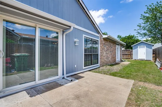 a view of backyard with green space