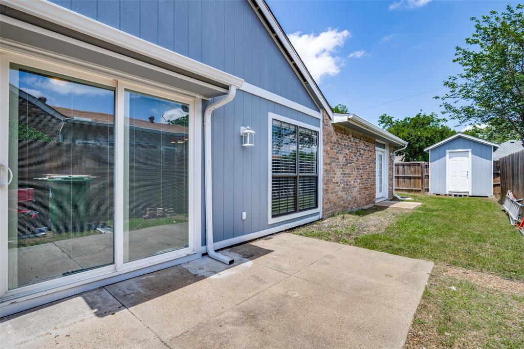 4430 Chapman Street The Colony, TX 75056 - Photo 22 of 24 a view of backyard with green space