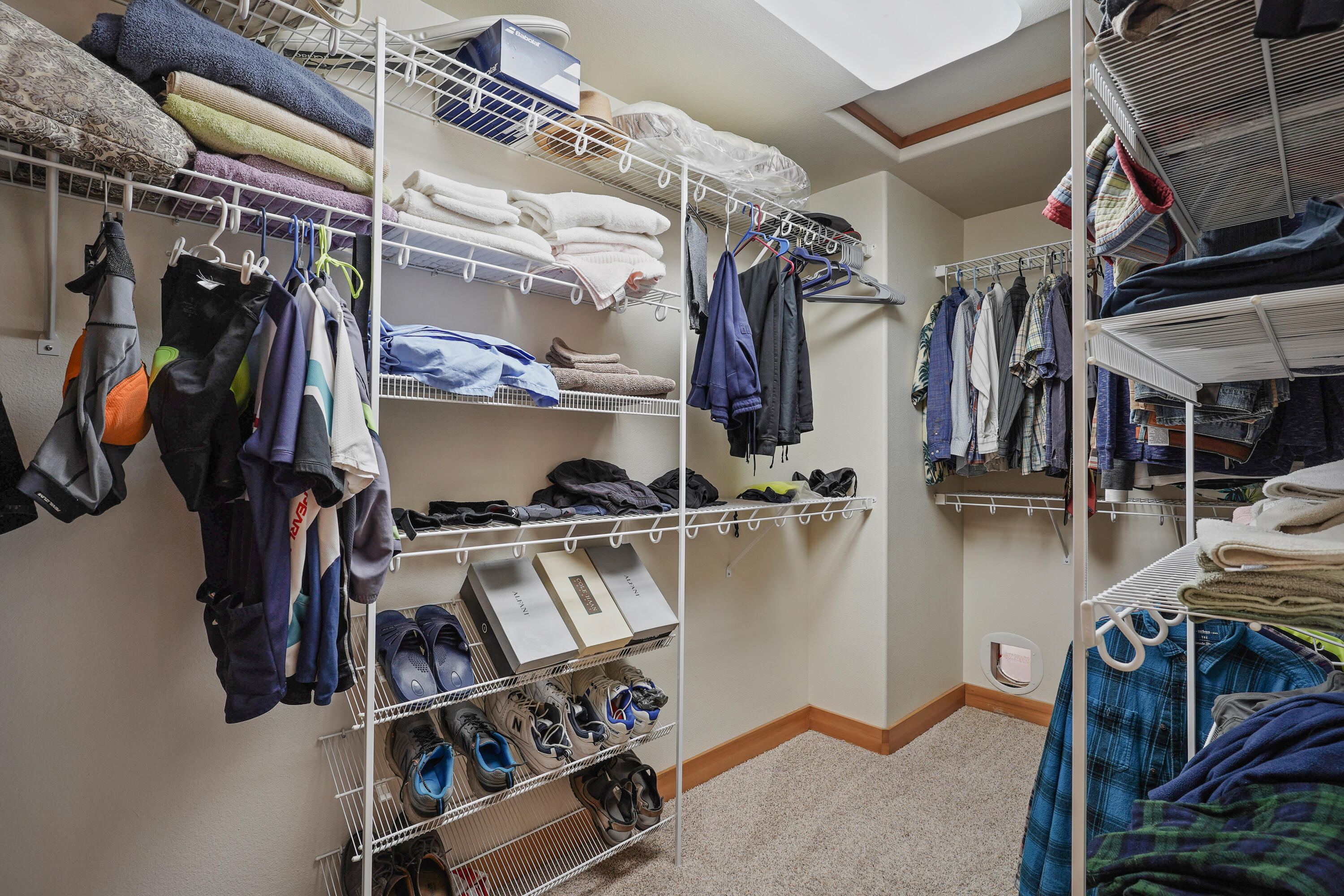 2155 Northwest Awbrey Road Bend, OR 97703 - Photo 26 of 44 a view of walk in closet with clothes and shoes