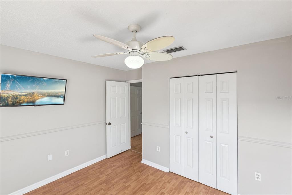 21 Cayman Circle Umatilla, FL 32784 - Photo 16 of 21 a view of an empty room with a fan