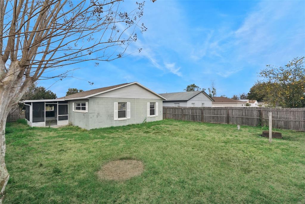 21 Cayman Circle Umatilla, FL 32784 - Photo 20 of 21 a house view with a garden space