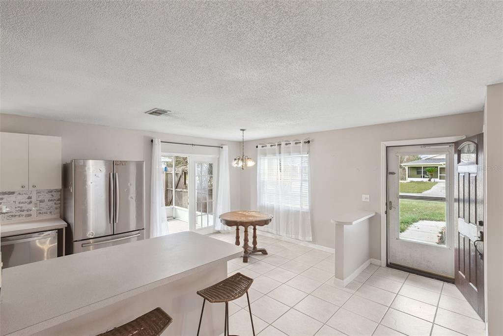 21 Cayman Circle Umatilla, FL 32784 - Photo 9 of 21 a living room with furniture and a window