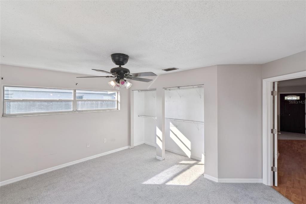 21 Cayman Circle Umatilla, FL 32784 - Photo 10 of 21 a view of a livingroom with a chandelier fan