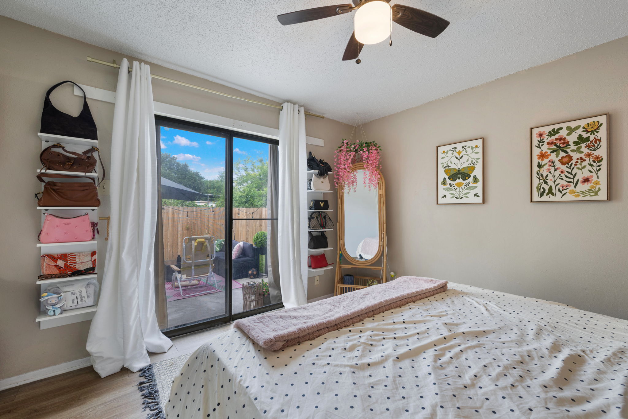 8317 Forest Ridge Drive San Antonio, TX 78239 - Photo 14 of 26 A private outdoor space extends from this restful bedroom, creating a serene personal retreat.