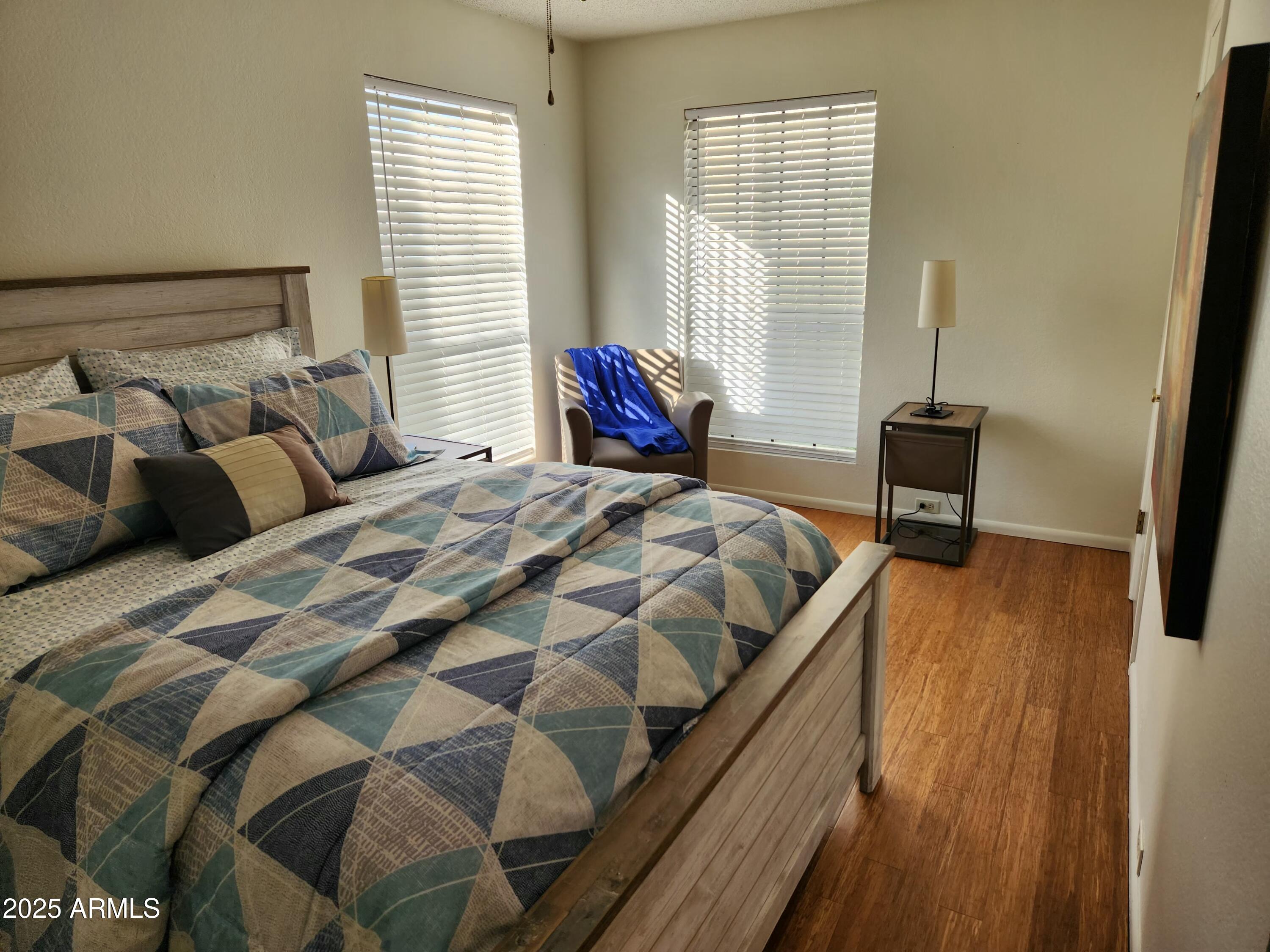 7557 North Dreamy Draw Drive, Unit 184 Phoenix, AZ 85020 - Photo 24 of 28 a bedroom with a bed and a window