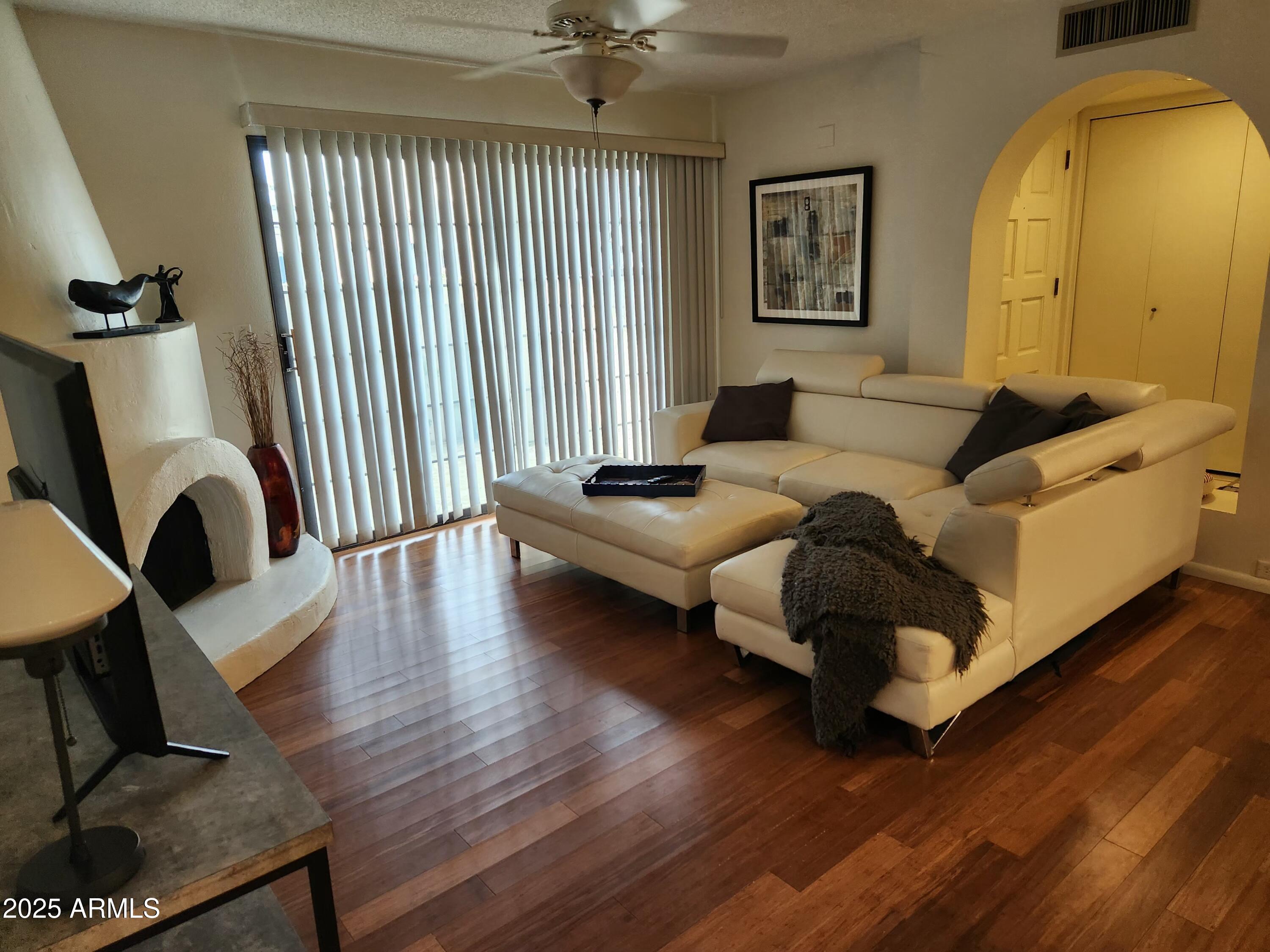 7557 North Dreamy Draw Drive, Unit 184 Phoenix, AZ 85020 - Photo 6 of 28 a living room with furniture and a window