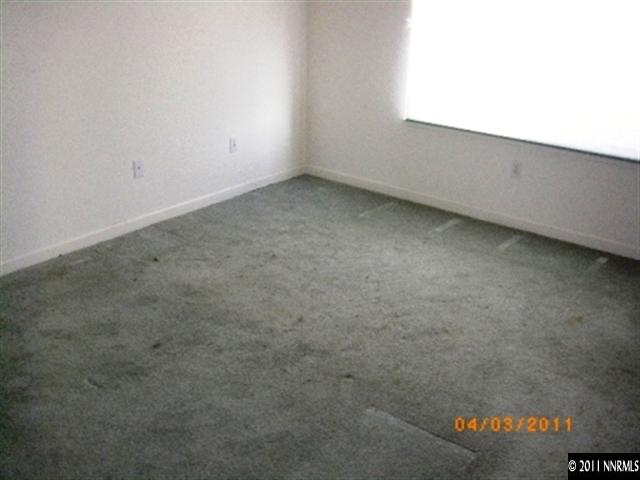 1777 Trek Trail Reno, NV 89521 - Photo 6 of 8 an empty room with a window