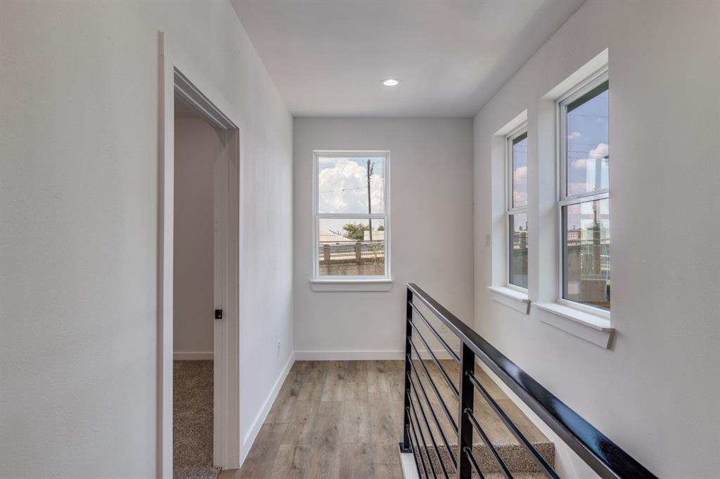 2427 Merlin Street Dallas, TX 75215 - Photo 13 of 24 a view of hallway with windows