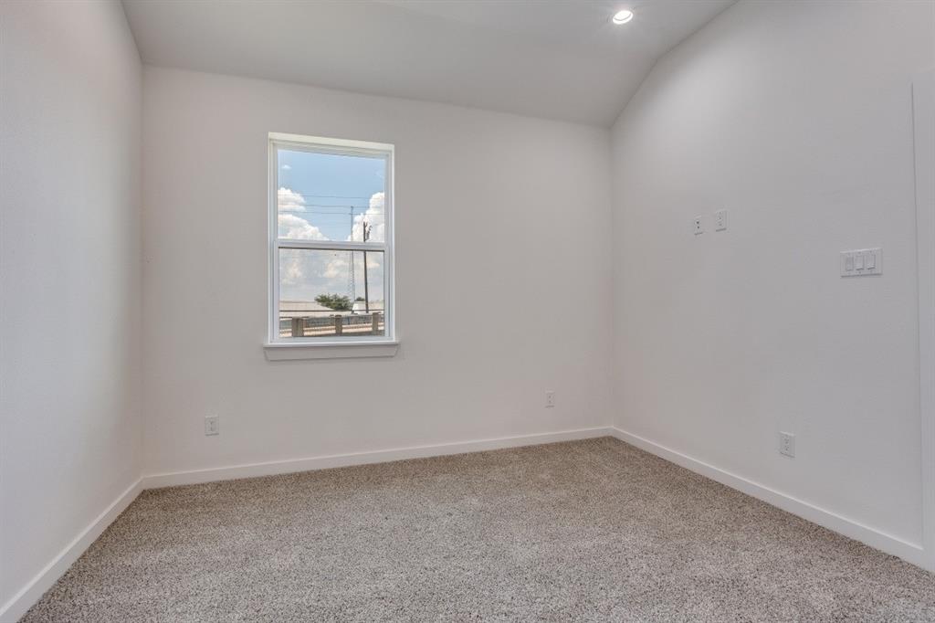 2427 Merlin Street Dallas, TX 75215 - Photo 16 of 24 an empty room with a window