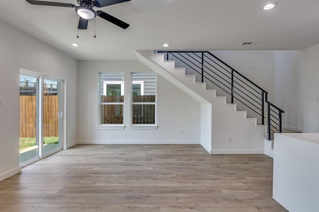 2427 Merlin Street Dallas, TX 75215 - Photo 9 of 24 a view of entryway and hall with wooden floor