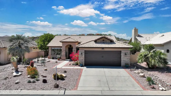 a view of a house with a patio