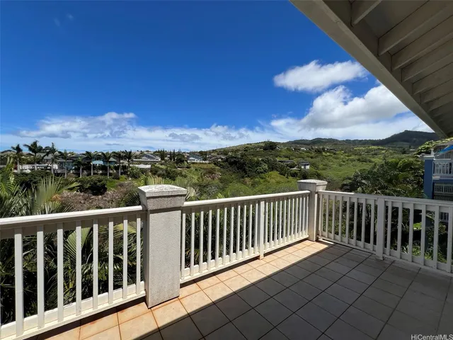a view of city from a balcony