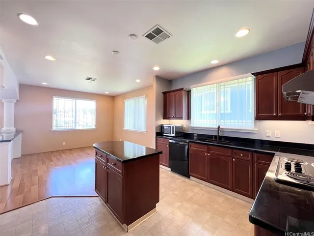 a kitchen with granite countertop lots of counter top space