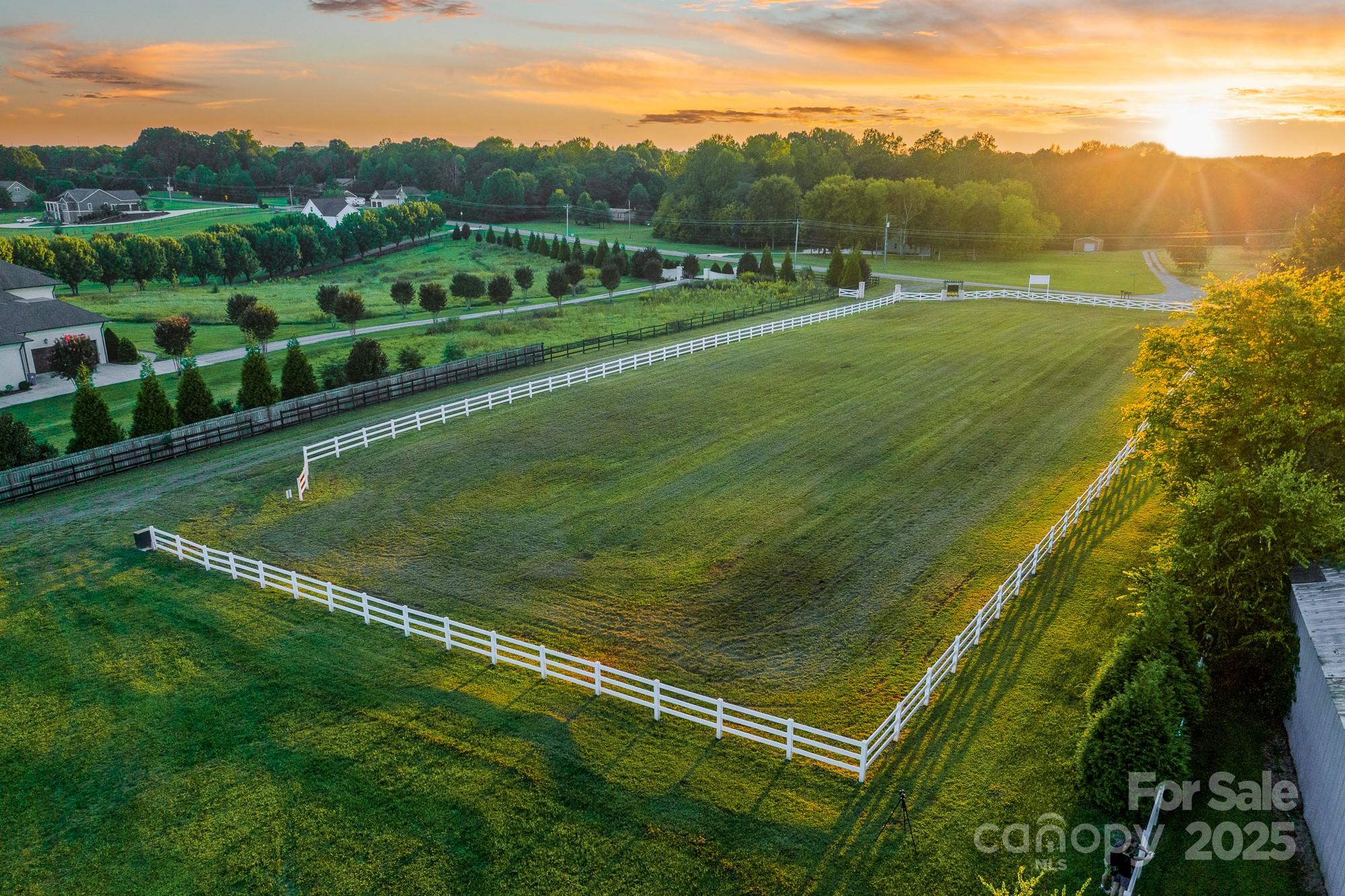 638 Patterson Farm Road Mooresville, NC 28115 - Photo 1 of 9 a view of a field with mountains in the background