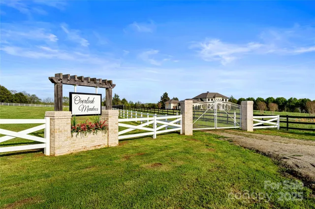 a view of a house with a big yard