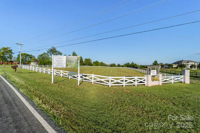 a view of a golf course with chairs