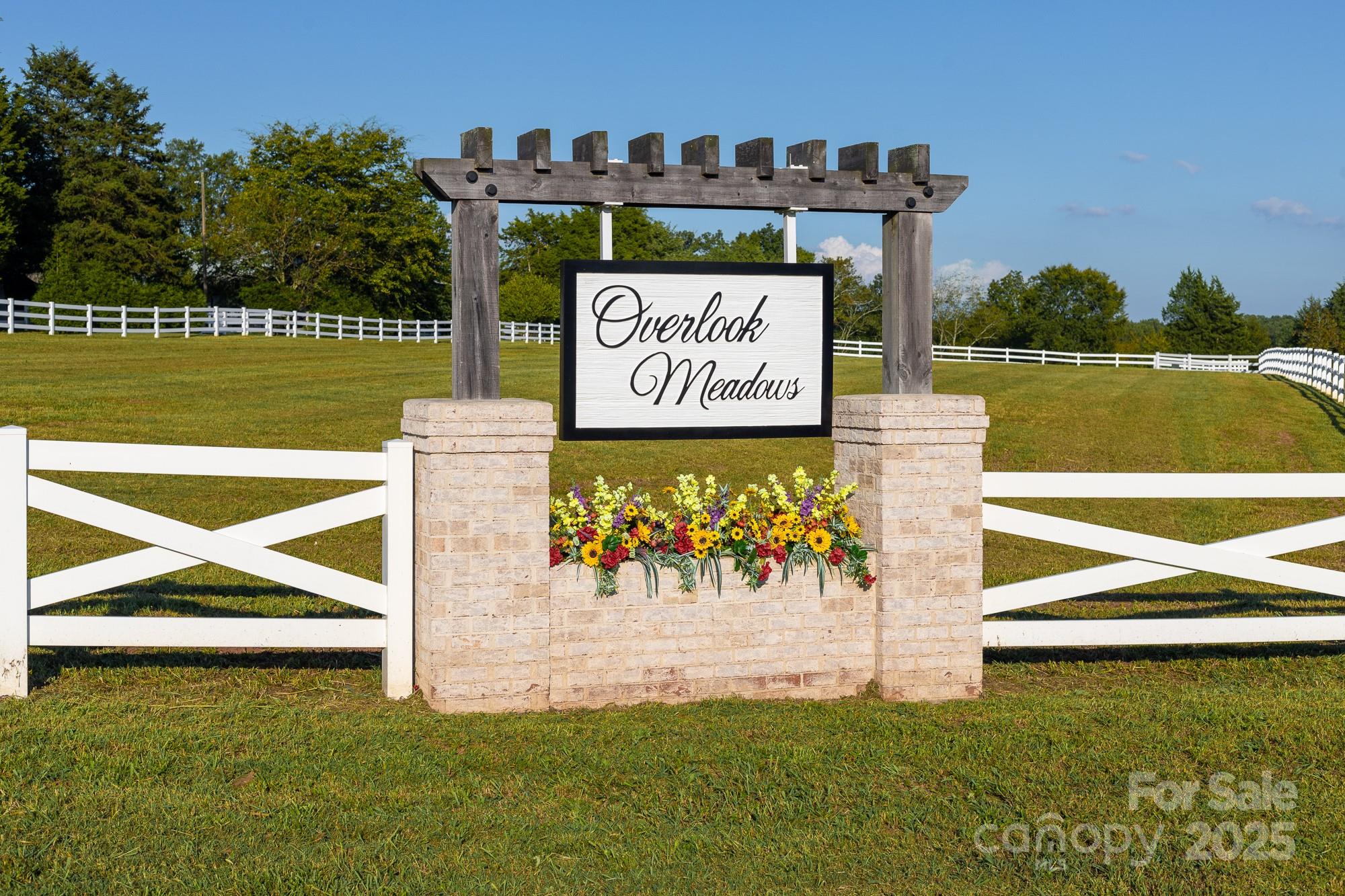 638 Patterson Farm Road Mooresville, NC 28115 - Photo 5 of 9 a sign on the side of the building