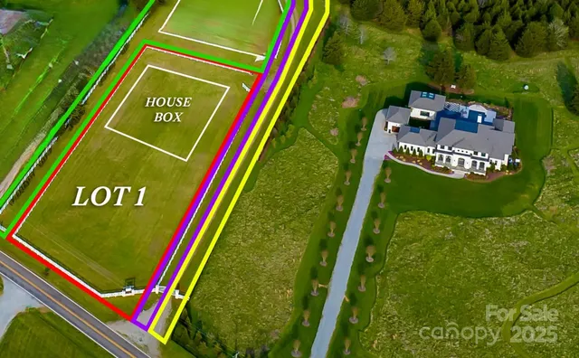 a view of a tennis ground with a park