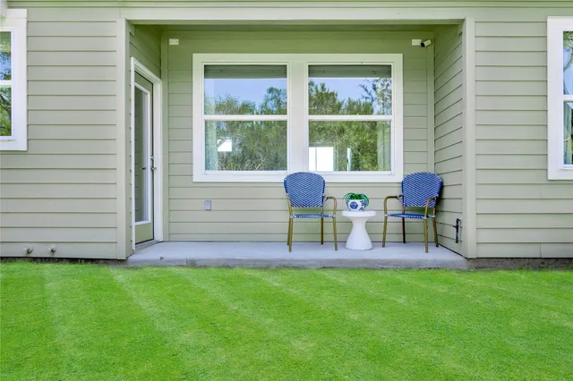 a garden view with a seating space