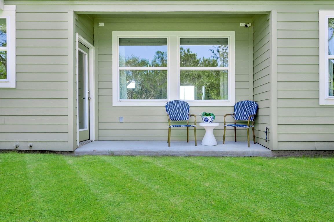 142 Volterra Lane Dripping Springs, TX 78620 - Photo 24 of 37 a garden view with a seating space