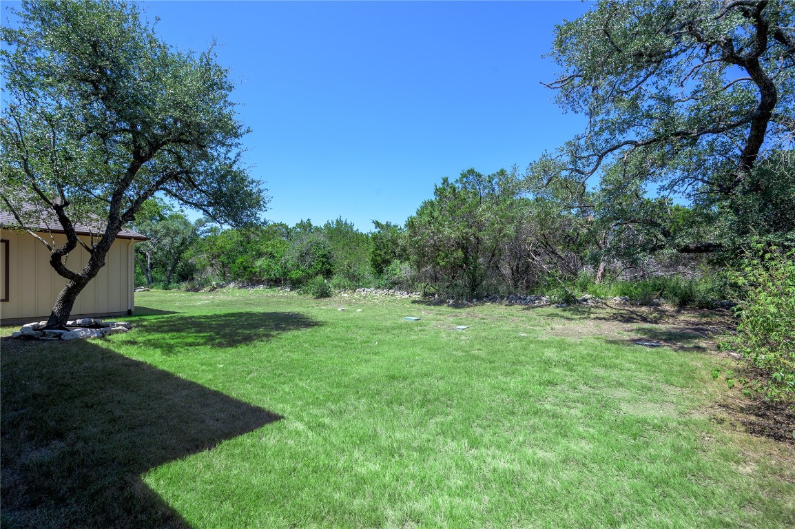 142 Volterra Lane Dripping Springs, TX 78620 - Photo 28 of 37 a view of backyard with green space