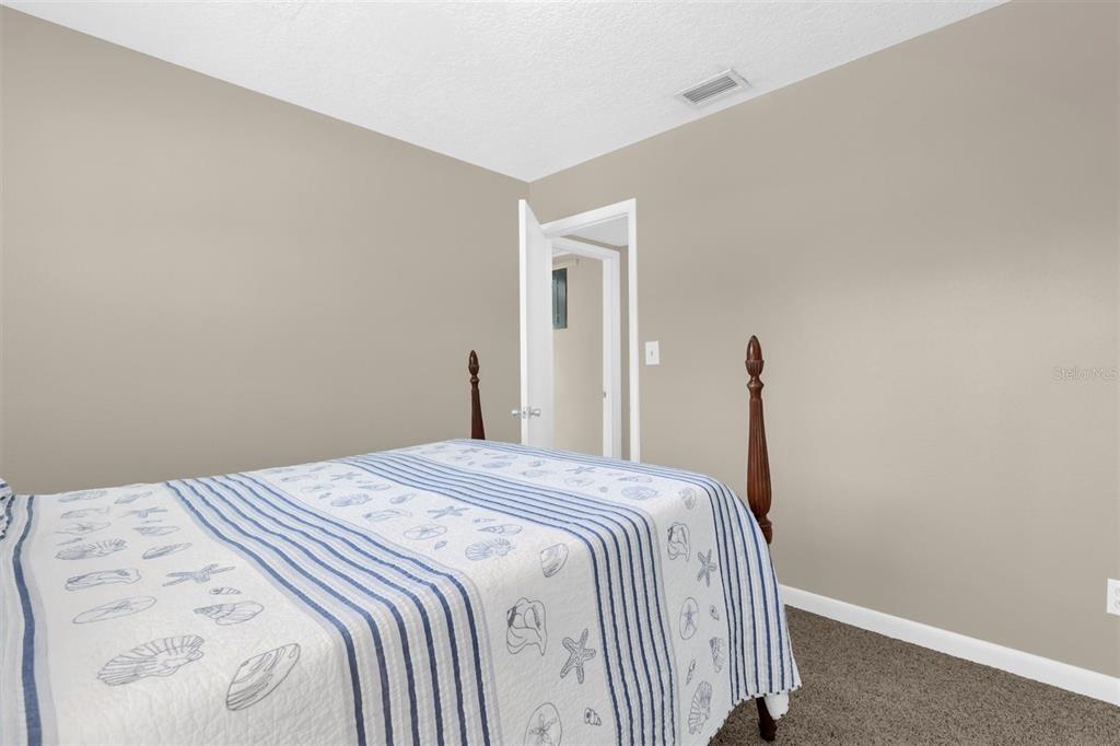 106 Oak Street Altamonte Springs, FL 32714 - Photo 15 of 30 a bedroom with a bed and a window